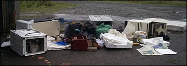 Scattered items with overflowing bags
