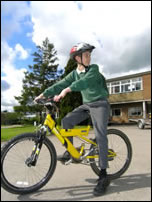 Schoolboy on a bicycle