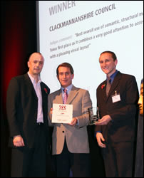 Daniel Champion receiving the award from Garry Richardson & Trenton Moss